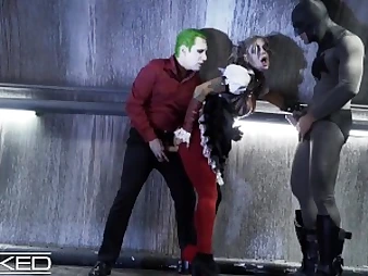 Harley Quinn gets fiercely double-teamed by Joker & Batman in Unholy costume play scene